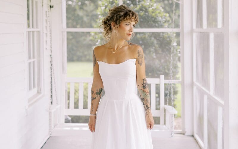 Bride wearing a strapless A-line wedding dress with a corset-style bodice
